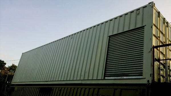 Forklift loading/unloading this stacked container was made easier with a roller shutter door fitted.